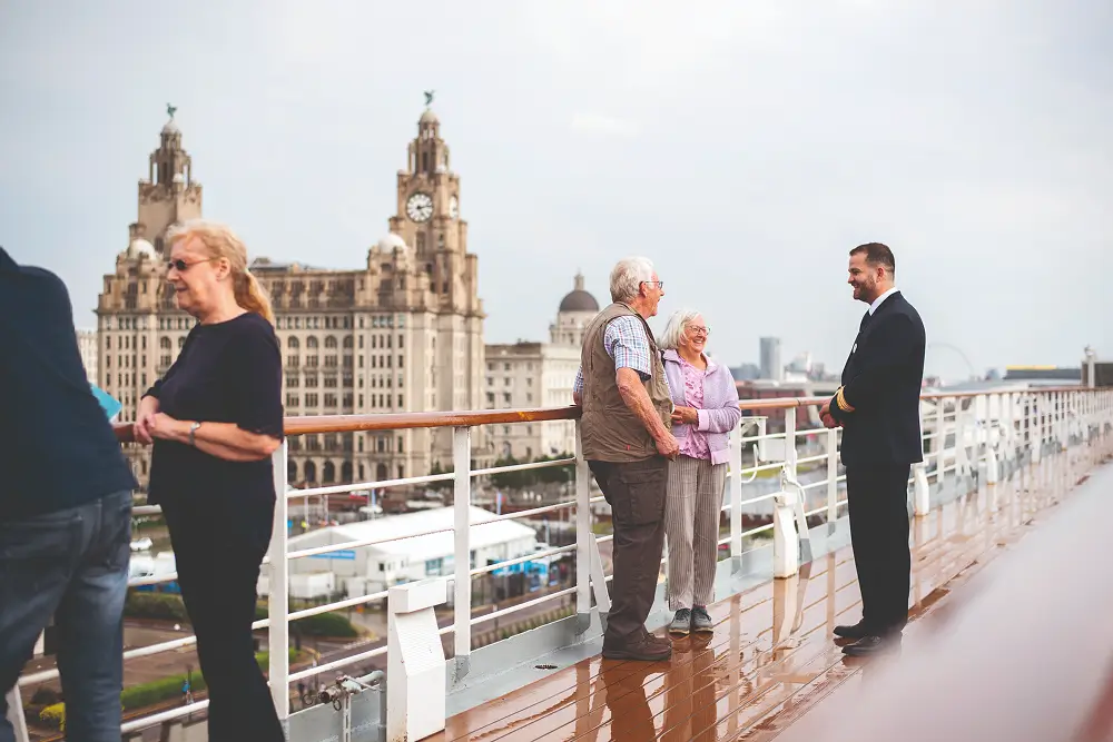 Guests on deck on Borealis sailing away from Liverpool 1